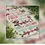 Thumbnail: Cross stitch birth announcement with text "First we had each other, then we had you, now we have everything."