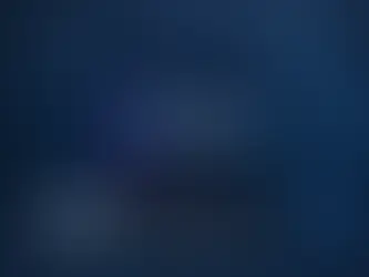 Laptop displaying "Copilot" logo on screen, set against a dark blue background with digital icons of a brain, chip, and chat bubble.