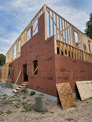 Exterior wall framing and sheathing on the two-story Beverly Road home under construction in Brookline, MA.