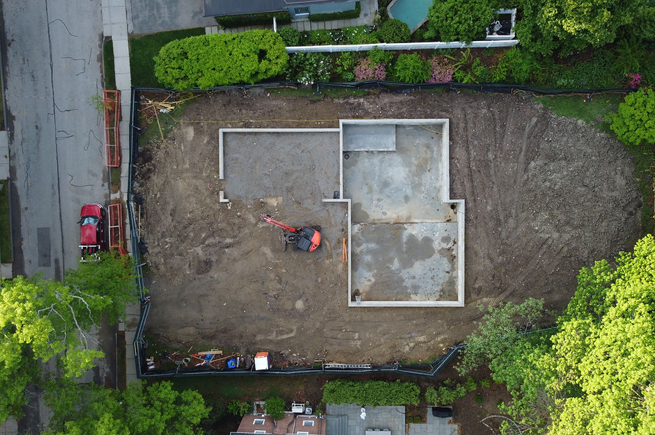 Aerial view of the new home foundation footprint at the Beverly Road construction project in Brookline