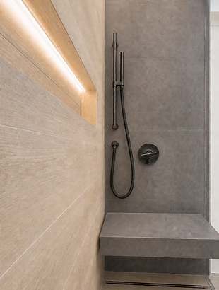 Handheld shower, built-in bench, and linear drain in a Newton, MA steam shower