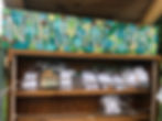 A shelf with packets of seeds