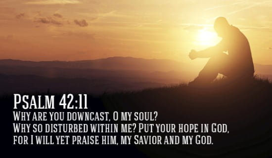 Person praying with sunset in the background with scripture from Psalm 42:11