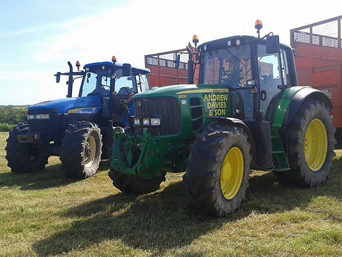 two tractors in field