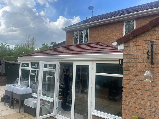 exterior of a conservatory with tiled roof