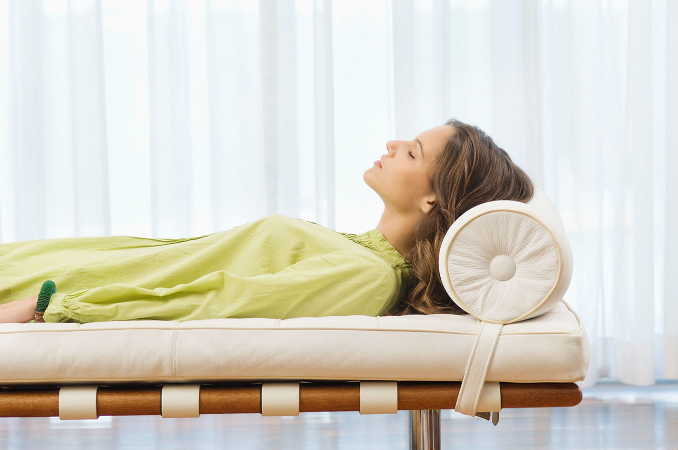 a woman lying on bed