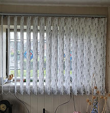 a window with open blinds