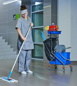 worker mopping floor