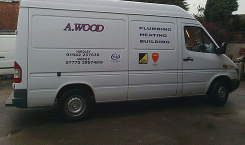 A Wood Plumbing Heating and Building Services van