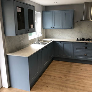 kitchen interior with dark cabinets