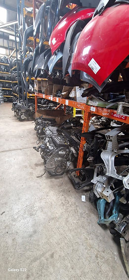 collection of car parts in a shop