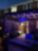 wooden pergola with illuminated lights