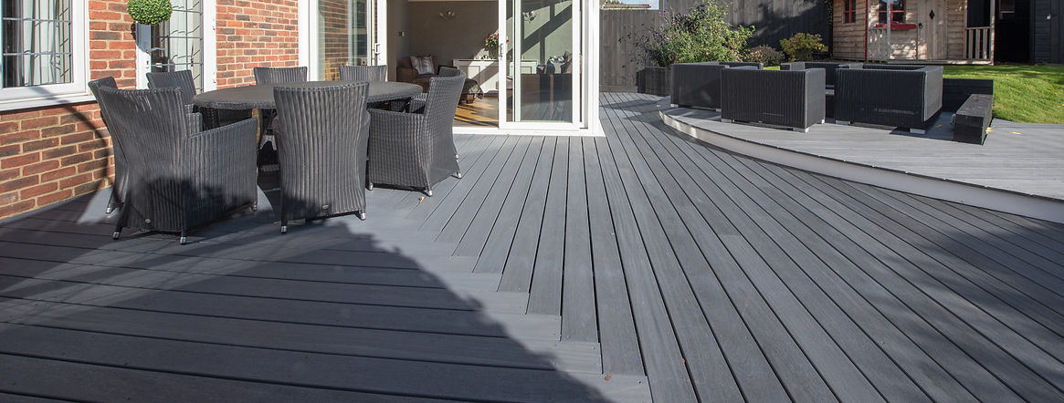 close-up image of wooden deck with furniture