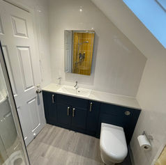 white tiled walls of a bathroom