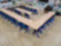 school interior with benches and chairs
