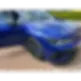 blue car with open door