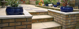 Brick garden steps and raised planting beds