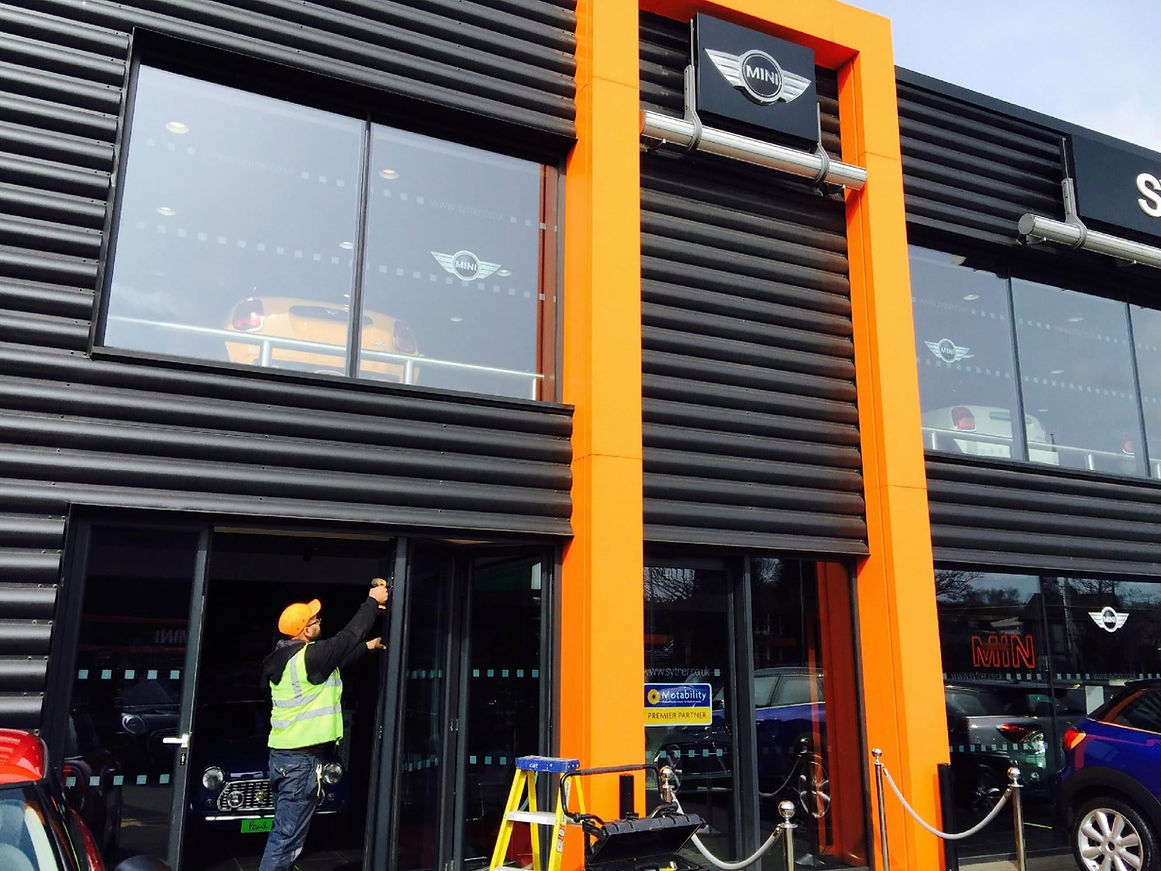 black and orange exterior of a shop