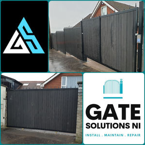 Black driveway gate installed in a residential area with logos of 'Gate Solutions NI' company