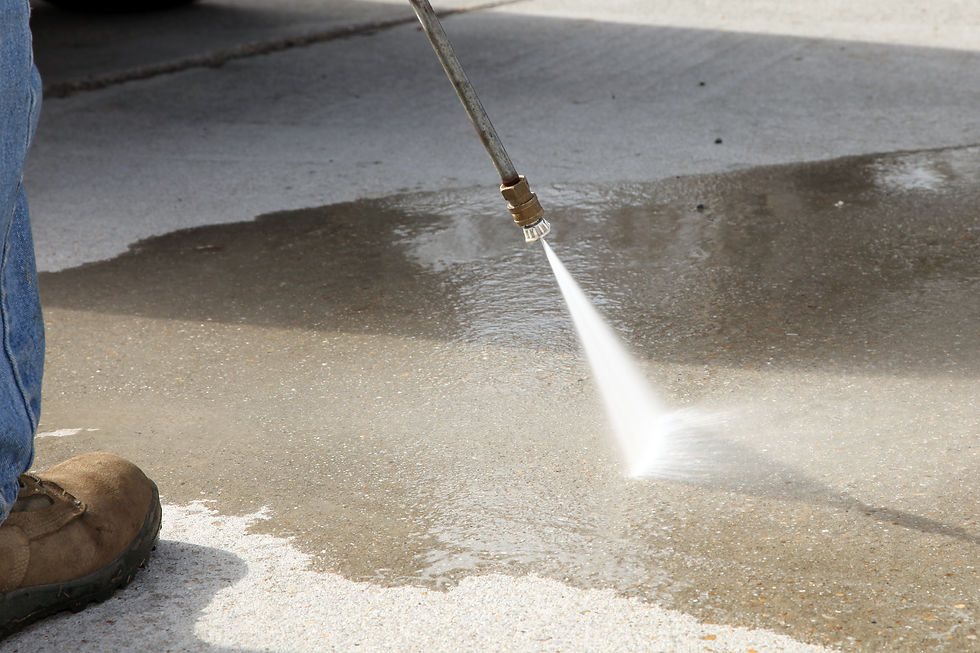 close-up image of high-pressure washer on paving