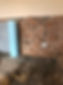 brick wall and a roll of transparent sheet
