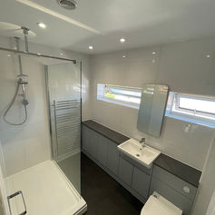 illuminated ceiling lights of a bathroom