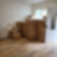 room featuring stacked boxes on the floor