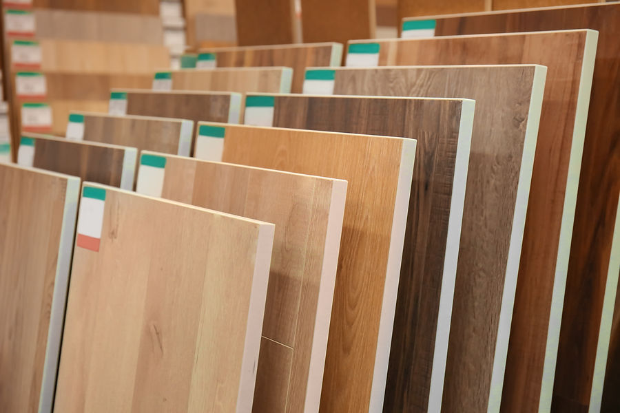 Assortment of laminated flooring samples in store