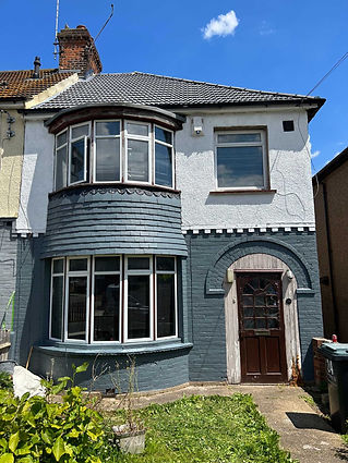front view of a house with brown door
