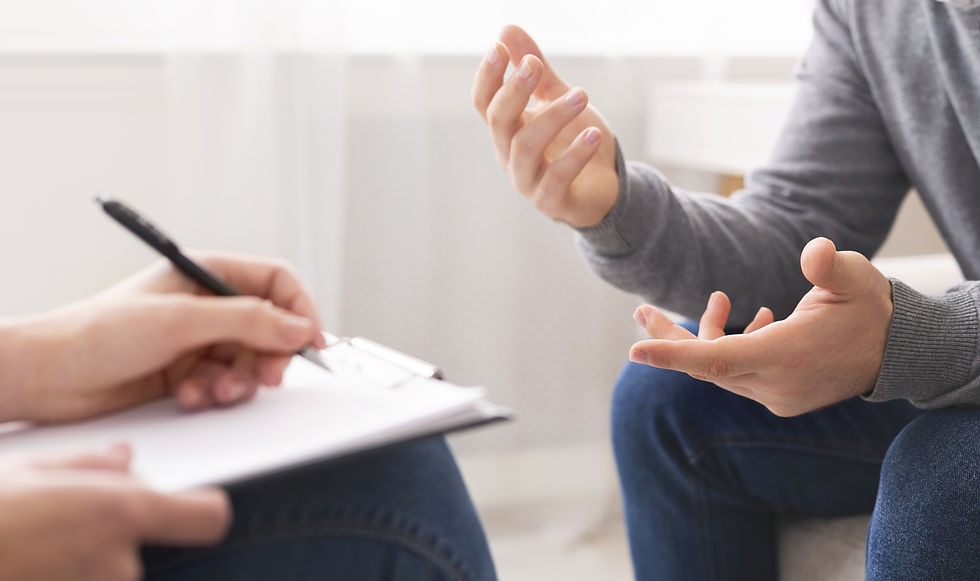 two person's hands during a therapy session