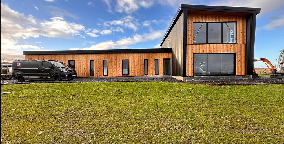 exterior of a modern house with a van parked in driveway