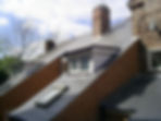 Roofing project with a raised window