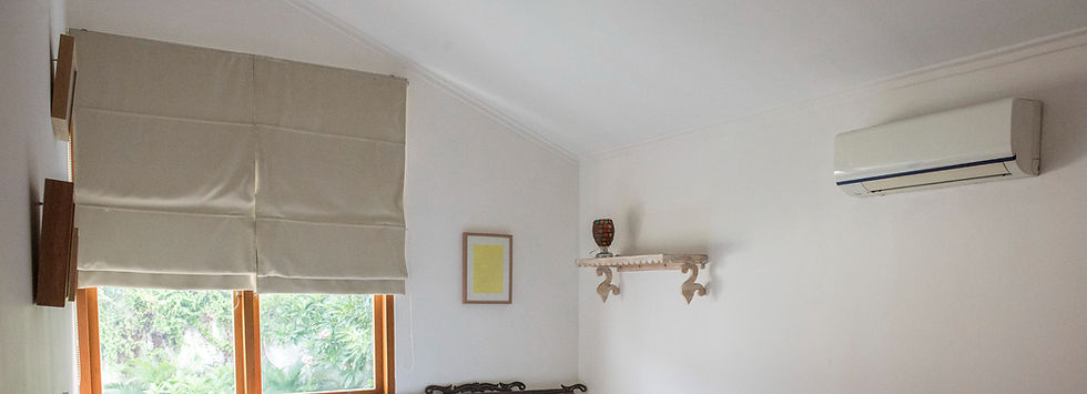 air conditioning unit on wall in a room