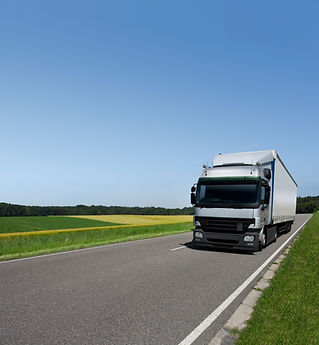 Blue sky above a white lorry