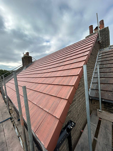 red tiles of roof and scaffolding