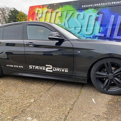 side view of black car