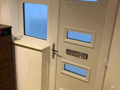 View of a door with two windows