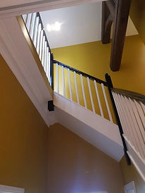 View of a staircase and landing from below