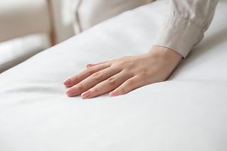 hand on white cloth