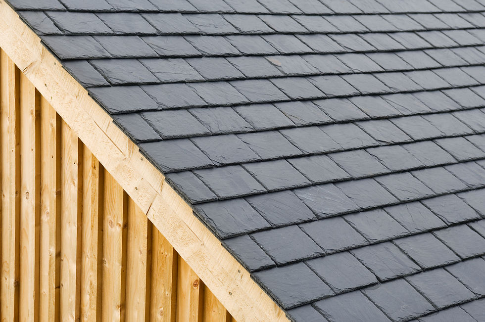 close-up image of black roof tiles