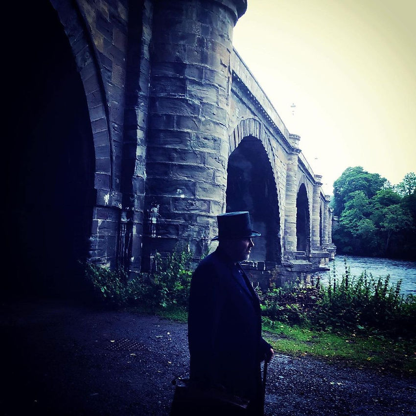 A man walking out of the castle