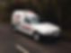 White delivery van parked on a rural road, featuring E.C. Autocare branding and contact in