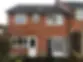 exterior view of a house with white windows