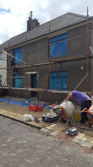 house exterior under renovation with scaffolding