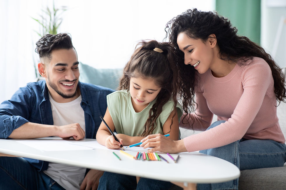 Parents helping the kid color.
