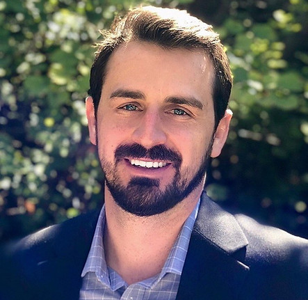 Mark Butler in a suit.