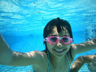Girl enjoying swim time at summer camp