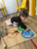 child using montessori materials