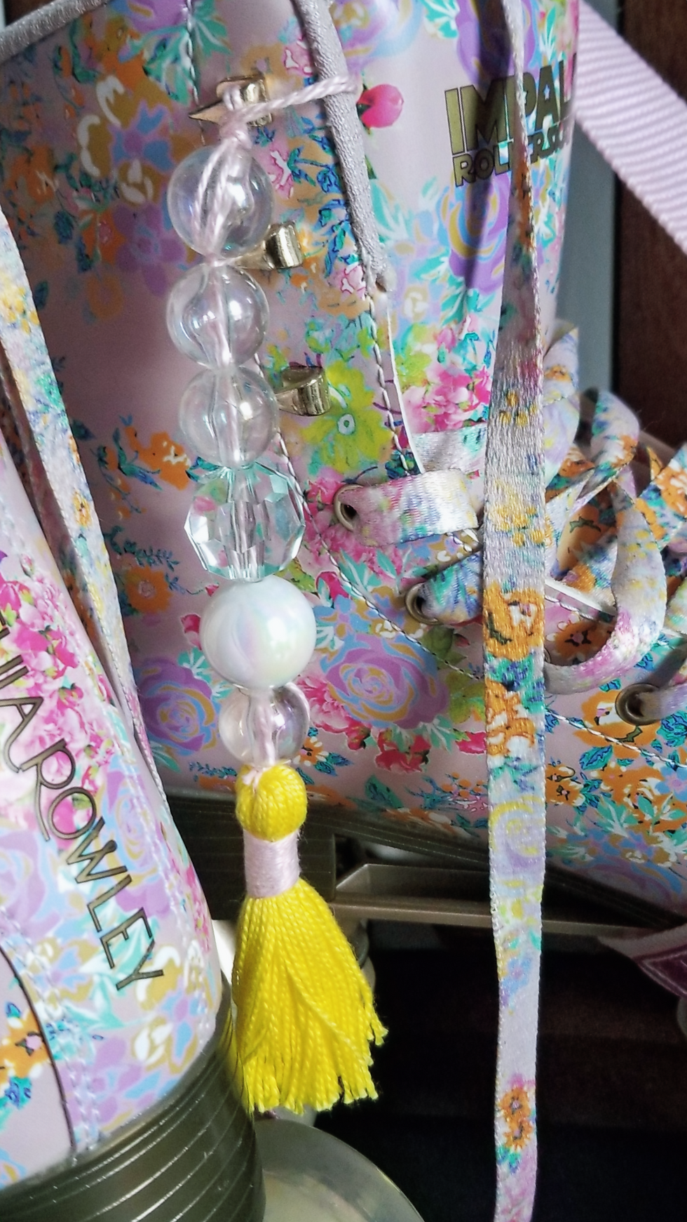 Floral roller skate charm with beads and tassel