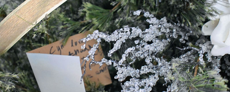 Connecting through a thank you note displayed in a decorated tree.